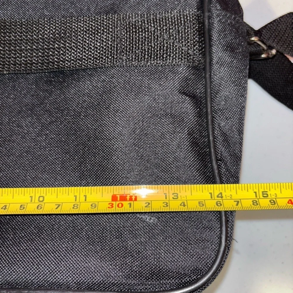 Black Laptop Bag with Adjustable Strap and Structured Design